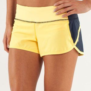 lululemon Speed Short Size 6 - Navy/Yellow (Burning Yellow / Inkwell)